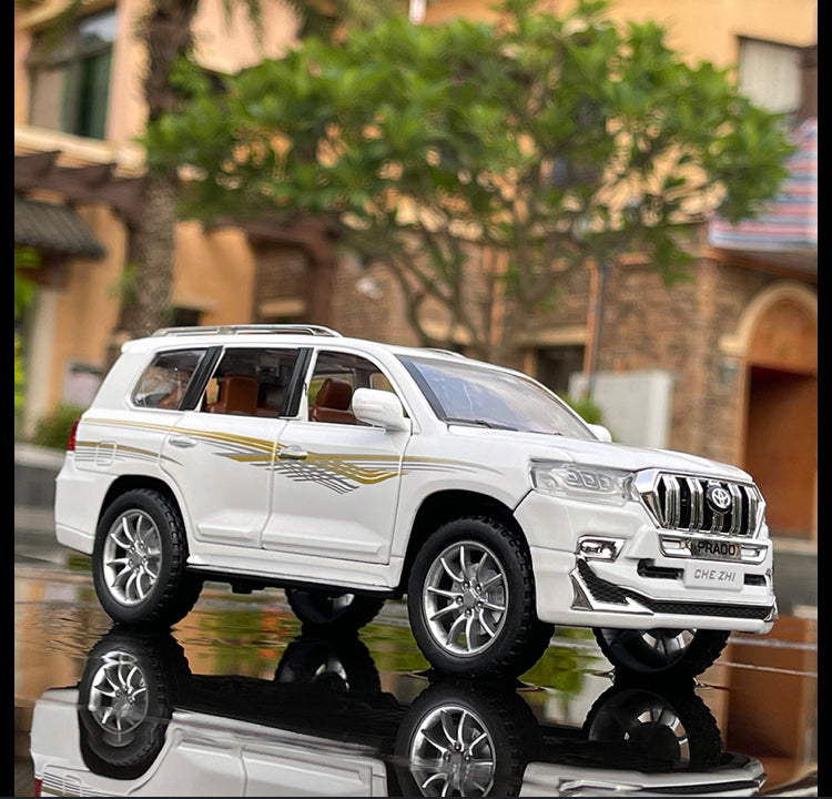 CARRO COLECIONÁVEL LAND CRUISER PRADO BRANCO ESCALA 1:18 - GameShop Angola